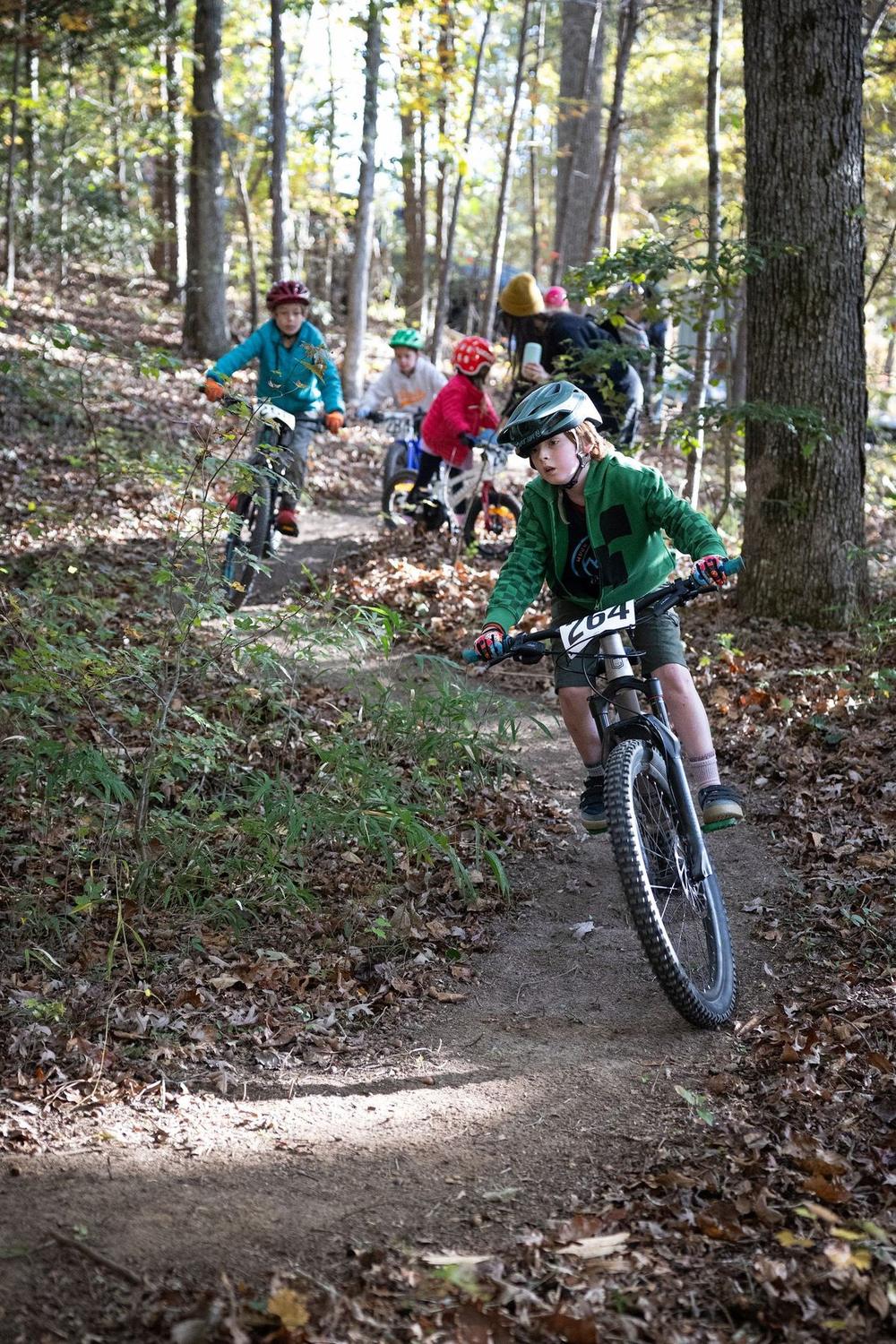 Kids riding singletrack